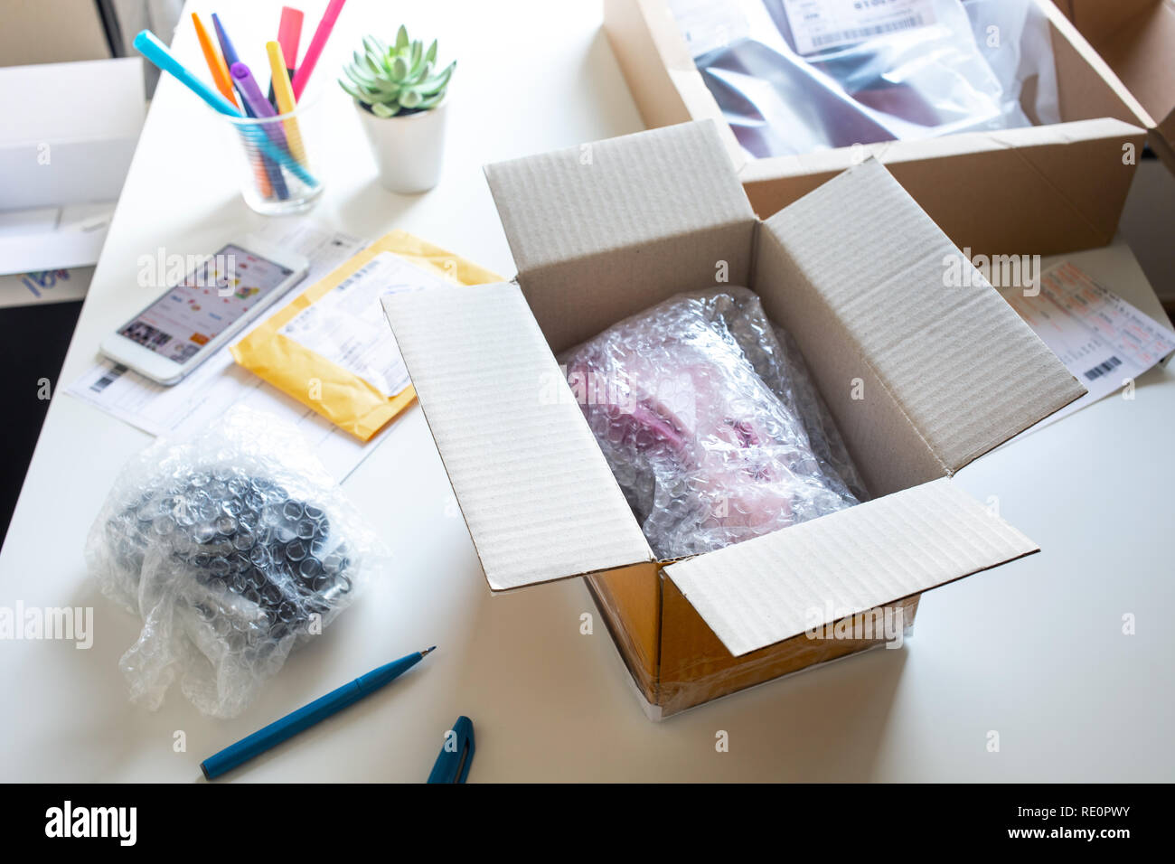 Online shopping concepts with product in box on desk table.Ecommerce,shipping delivery service.Business retail market Stock Photo