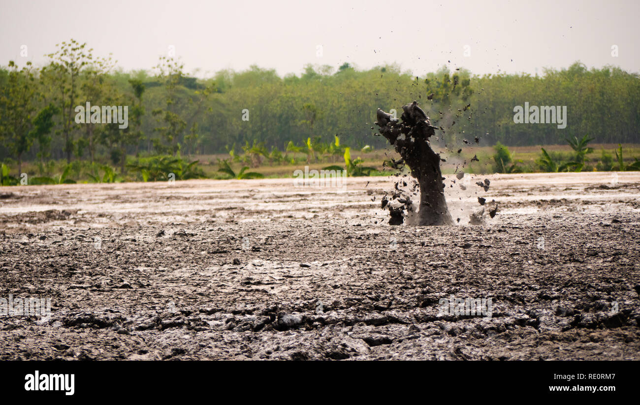 Java Mud Volcano mud volcano with bursting bubble bledug kuwu. volcanic plateau with ...