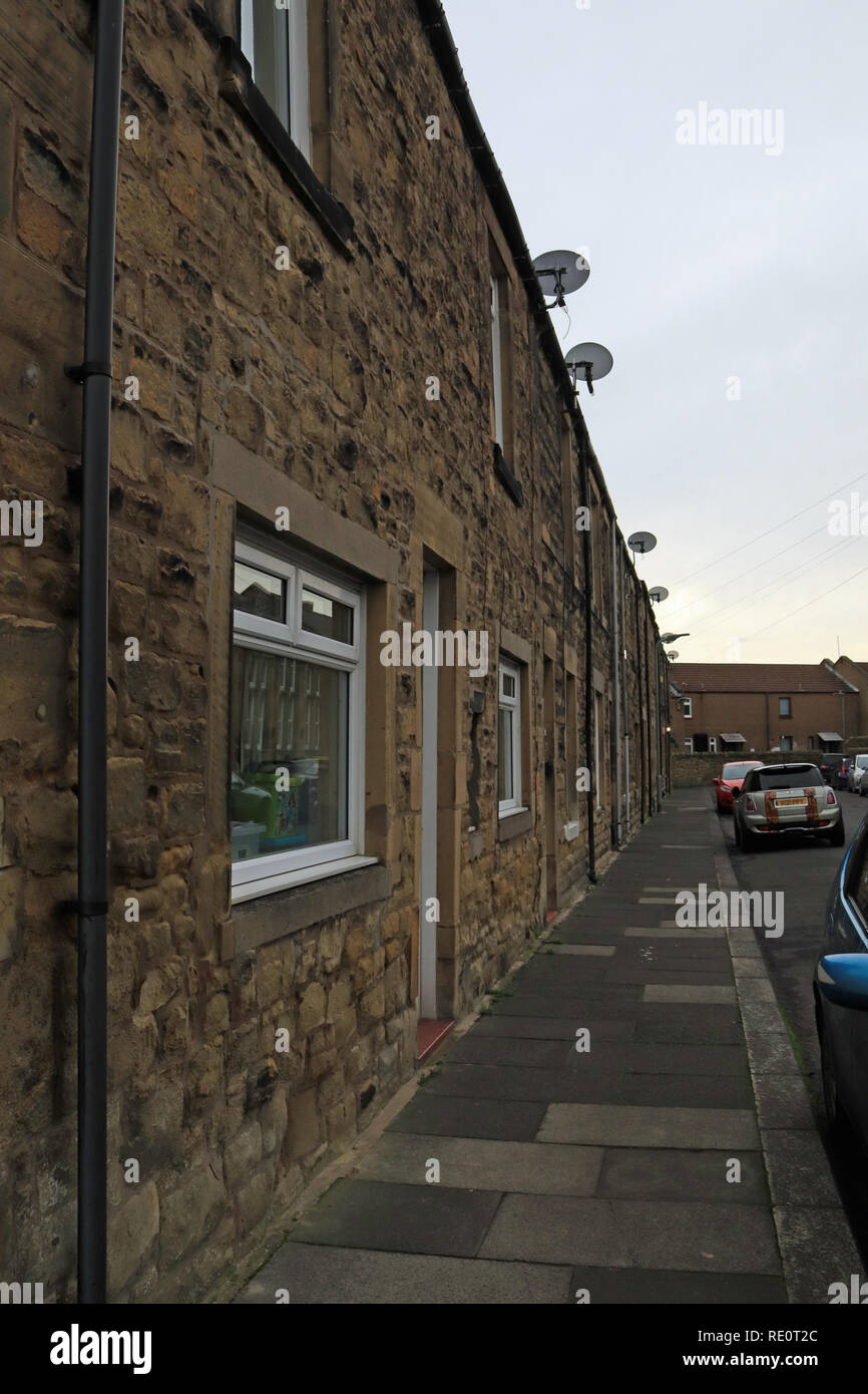 Terraced housing in Amble Dovecote Street in Amble. Amble is a small