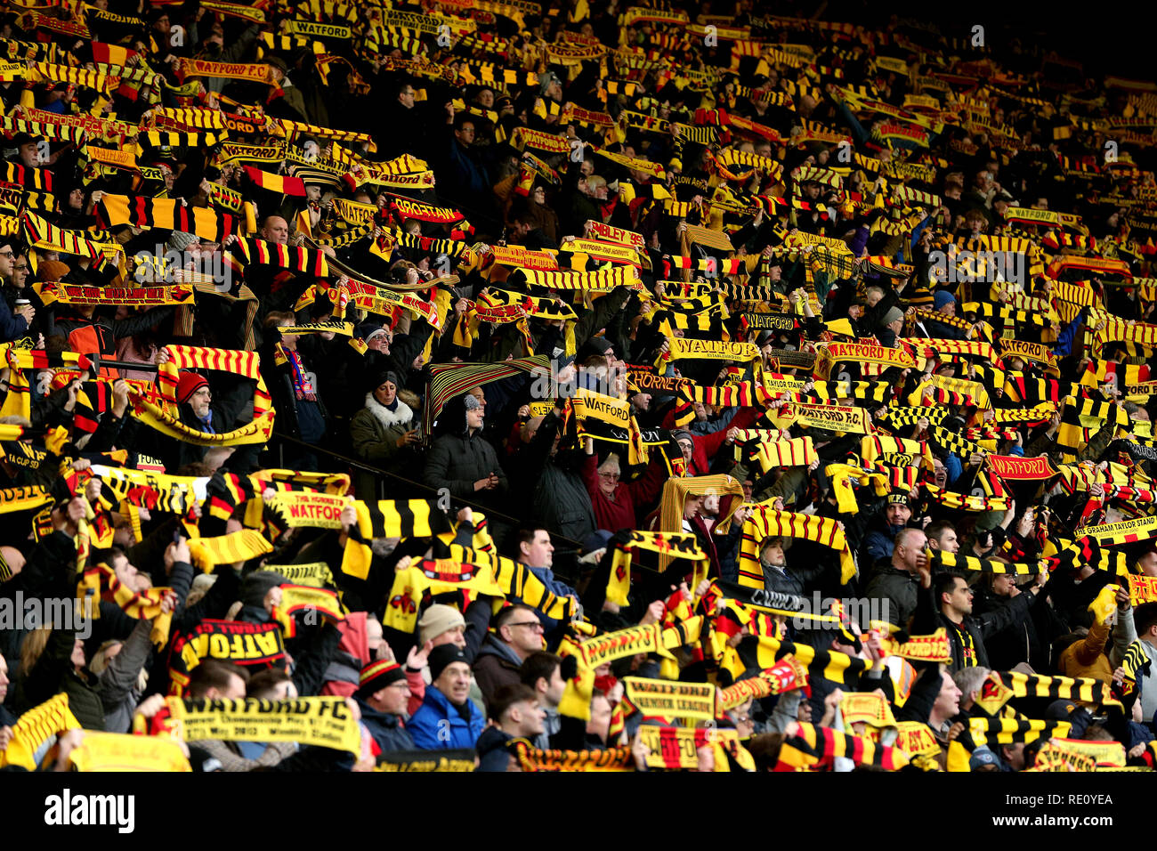 Watford fans show support for their team in the stands during the Premier  League match at Vicarage Road, Watford Stock Photo - Alamy