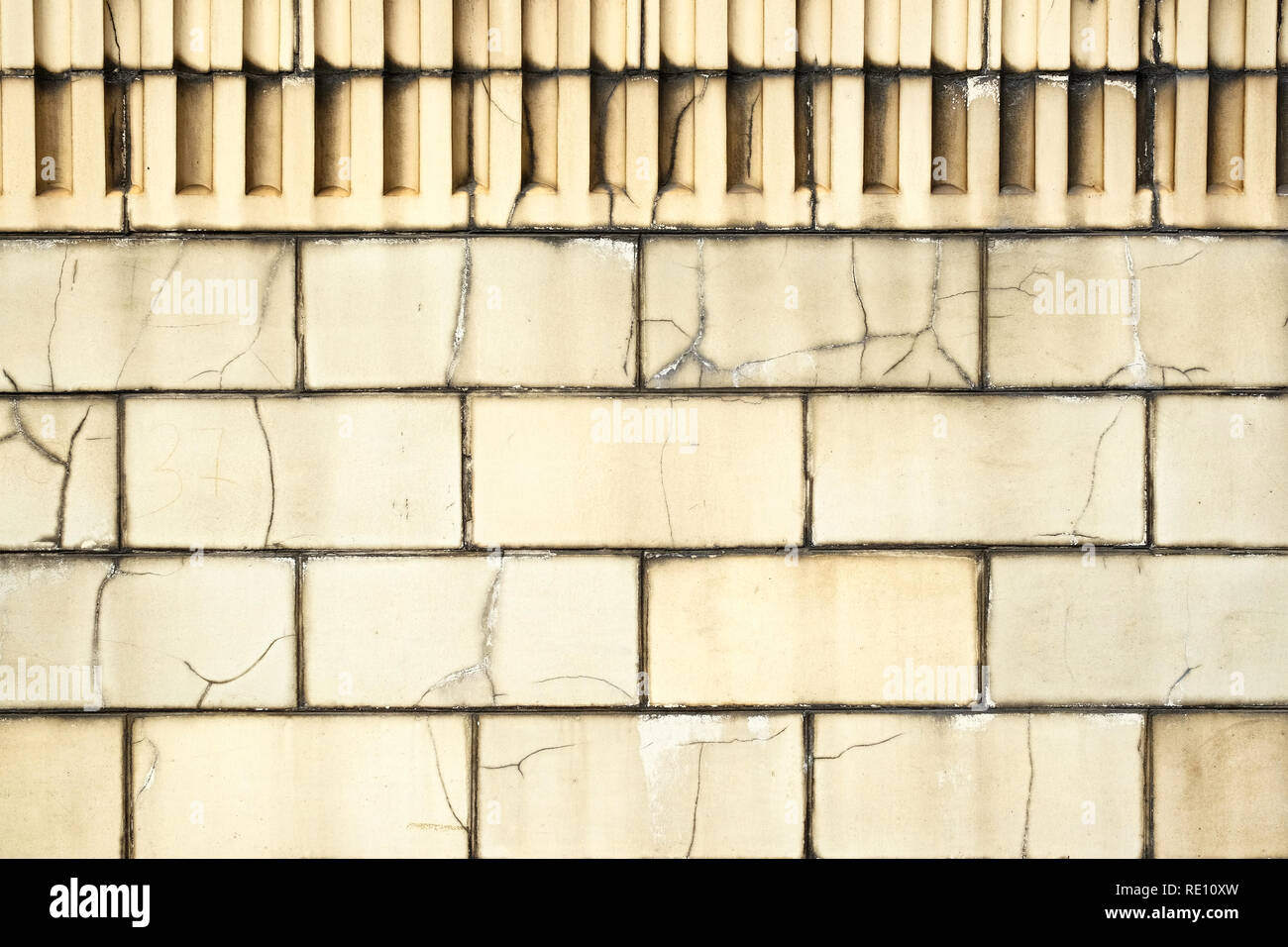 old cracked ceramic tiles. Cracked ceramic tile texture, surface Stock