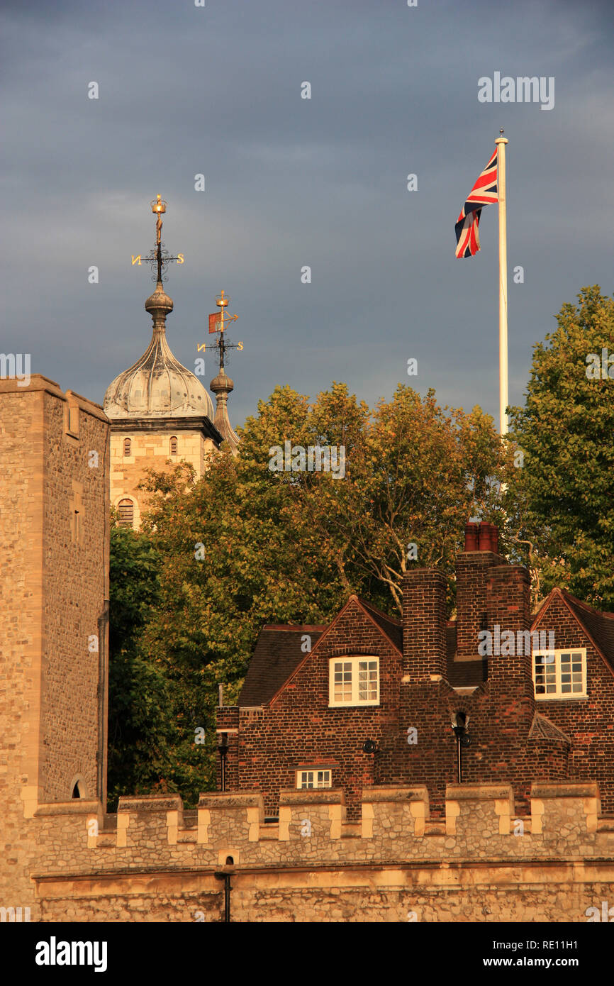 Union Jack waving on a flagpole at Her Majesty's Royal Palace and Fortress of the Tower of London, United Kingdom Stock Photo