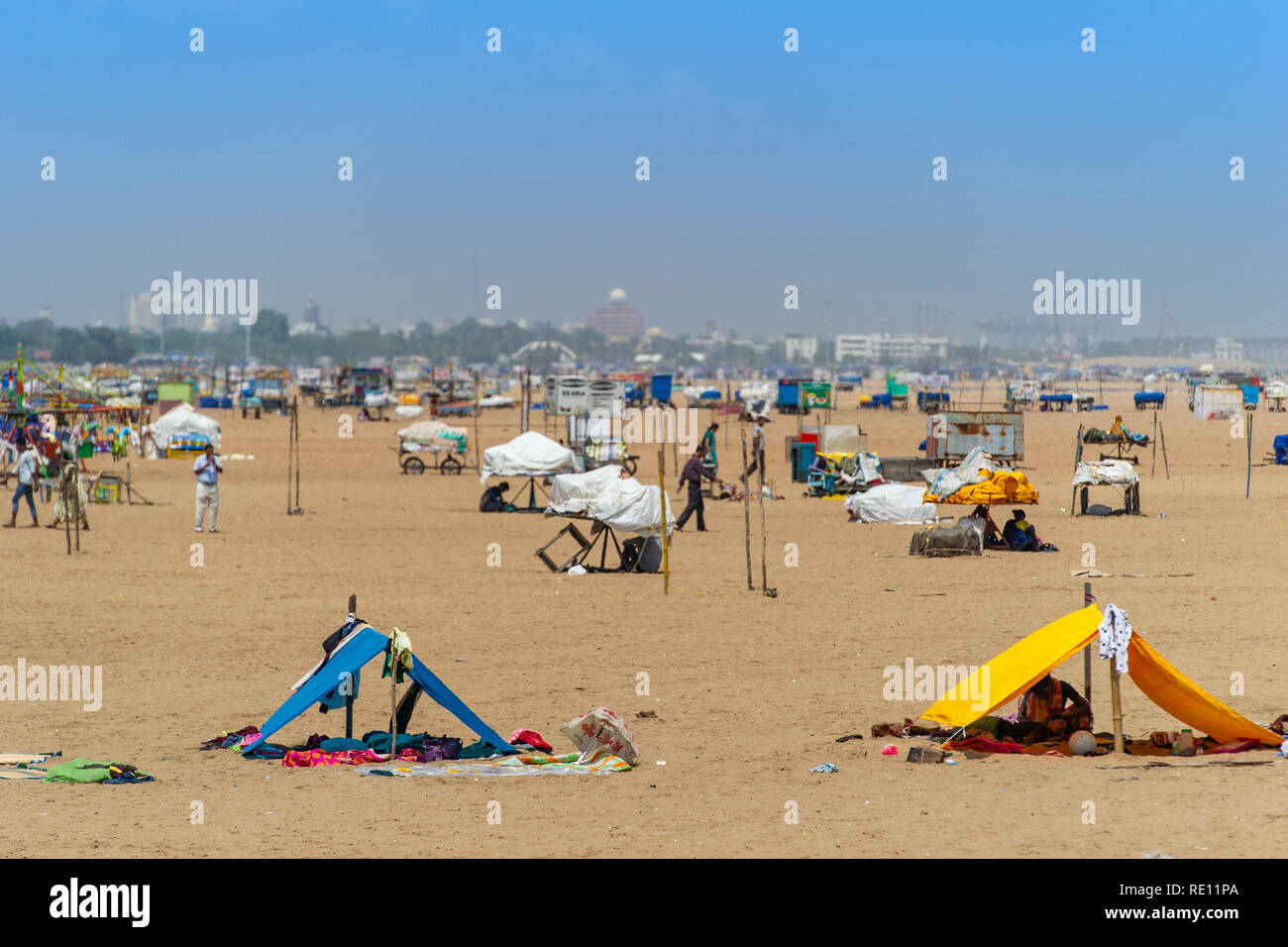 Fishermen's makeshift tents and nets on Marina Beach on the Bay of Bengal near Chennai, India Stock Photo