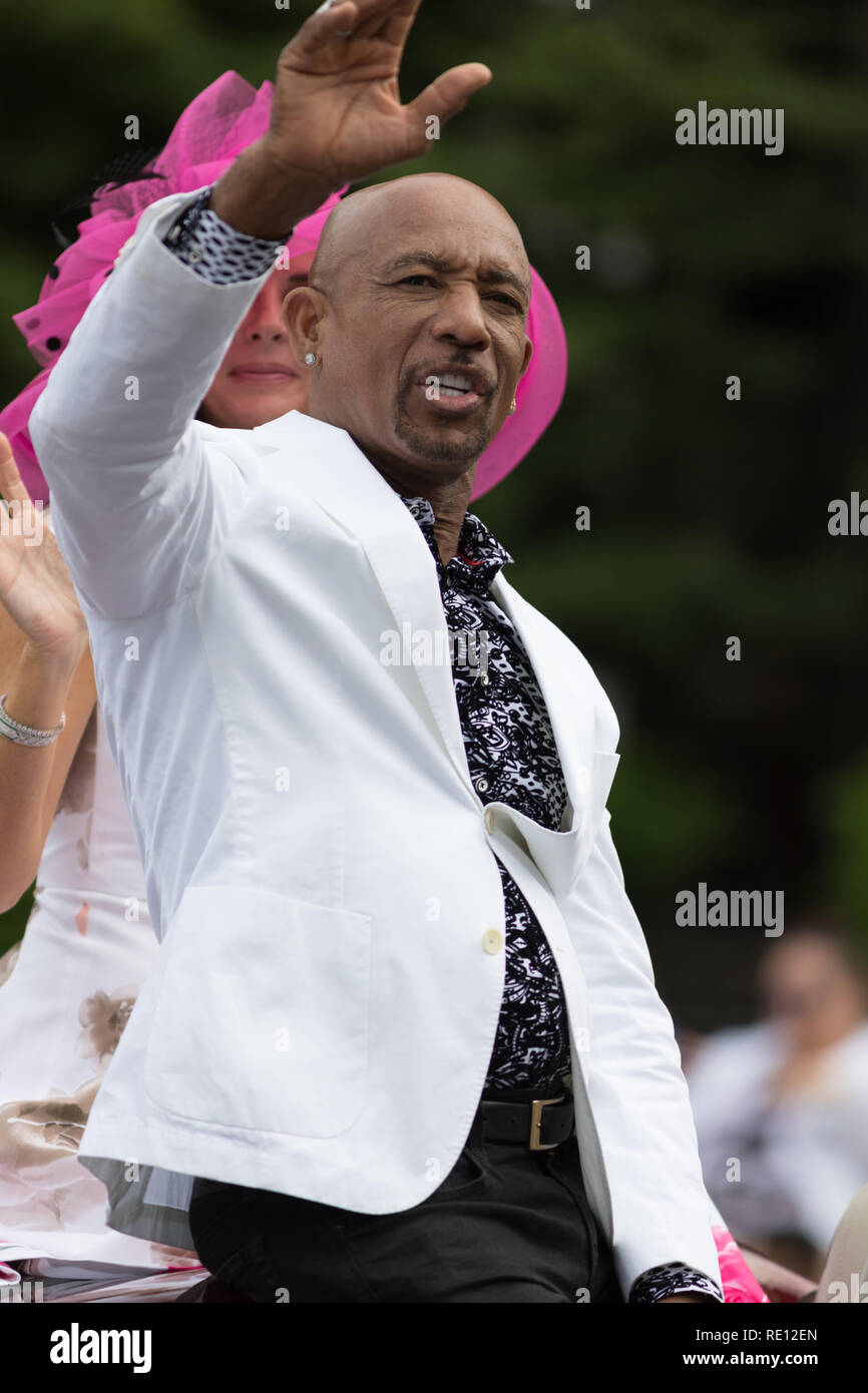 Louisville, Kentucky, USA - May 03, 2018: The Pegasus Parade, Montel Williams TV show host, riding on a car going down W Broadway Stock Photo