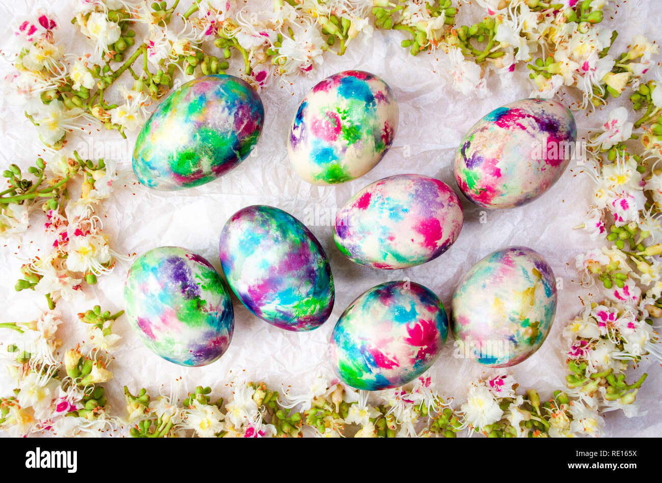 Easter eggs and spring flowers background flat lay Stock Photo - Alamy