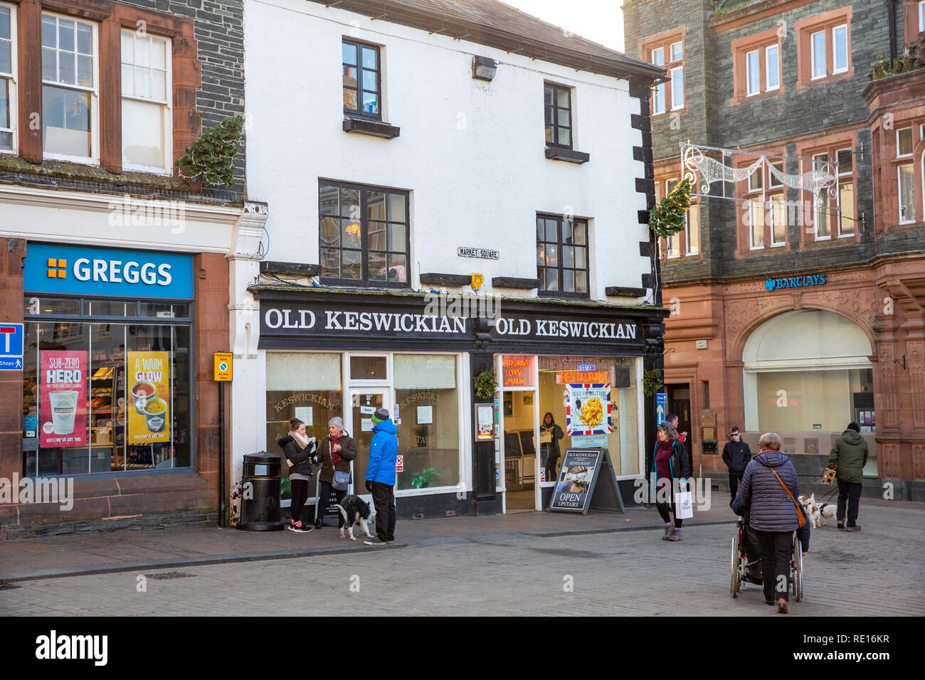 Keswick town centre with Greggs bakers and Old Keswickian fish and