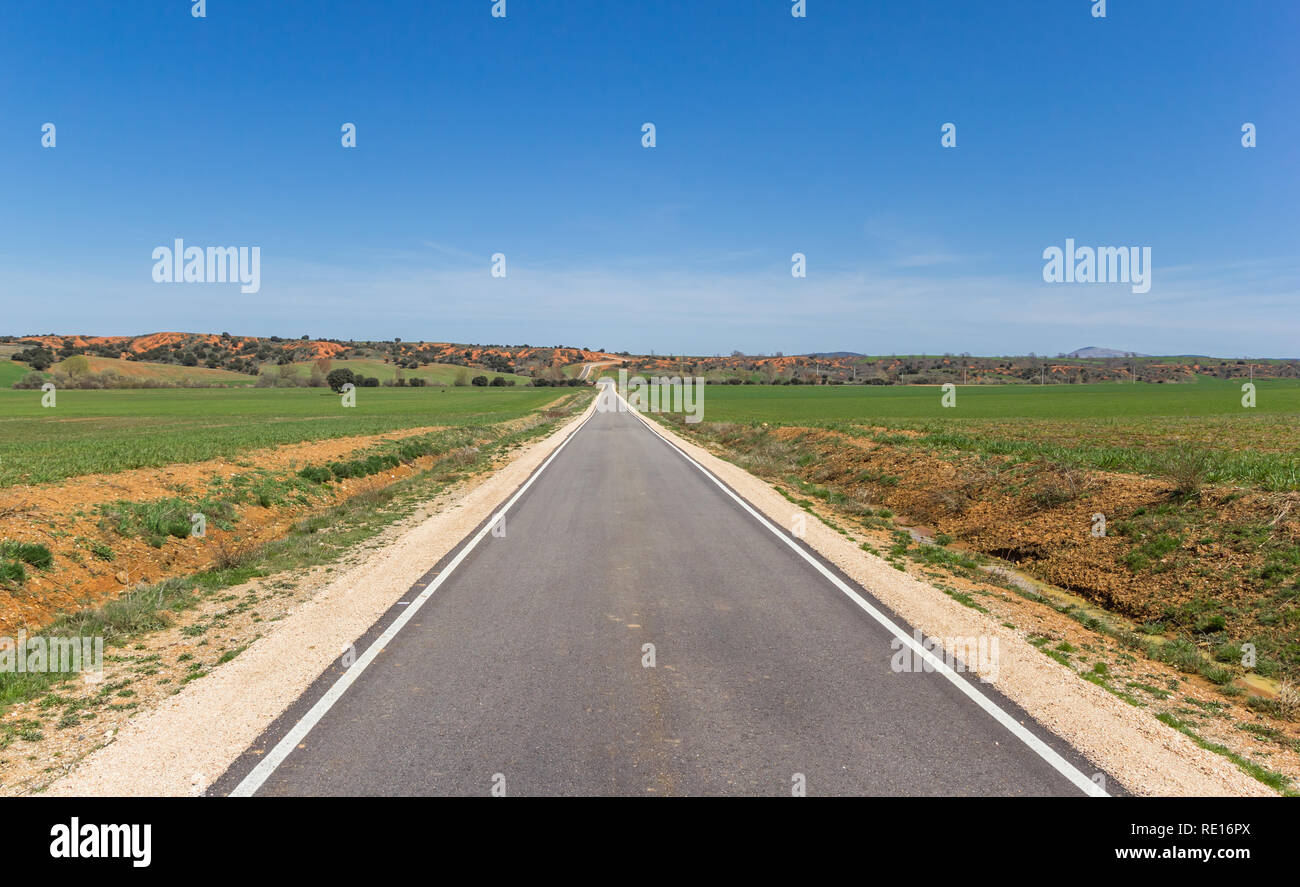 Narrow road in Castilla y Leon near Ayllon, Spain Stock Photo