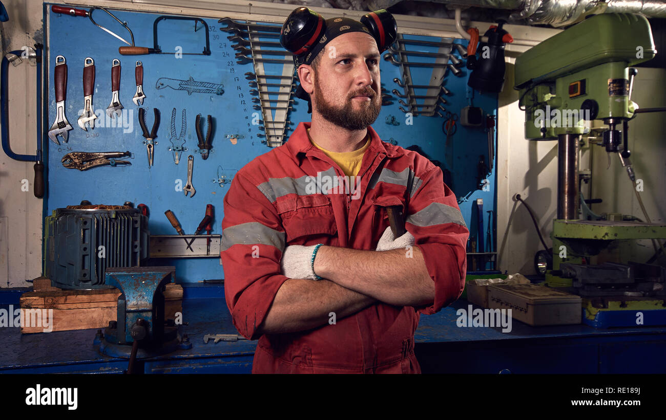 Closeup of auto mechanic. Auto repair service. Working tools background ...