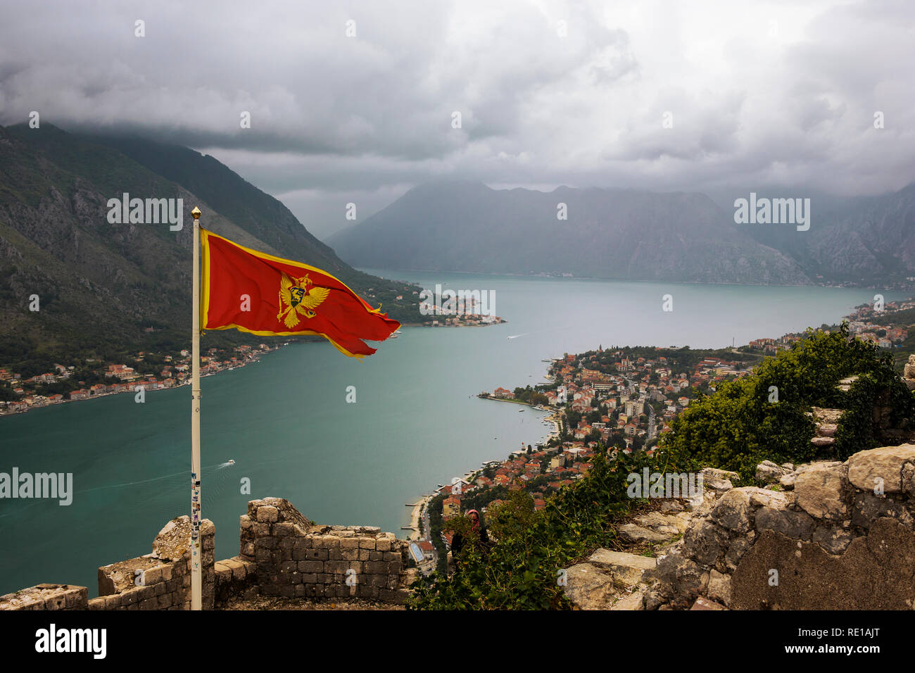 Montengrin flag on the battlements of St. John's Fort above Kotor, Montenegro Stock Photo