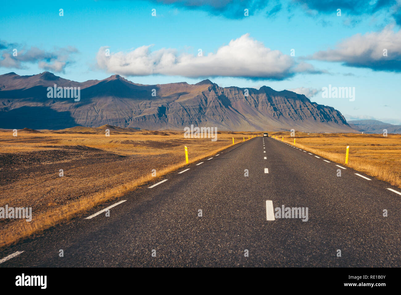 Empty road passing through amazing landscape in Iceland Stock Photo