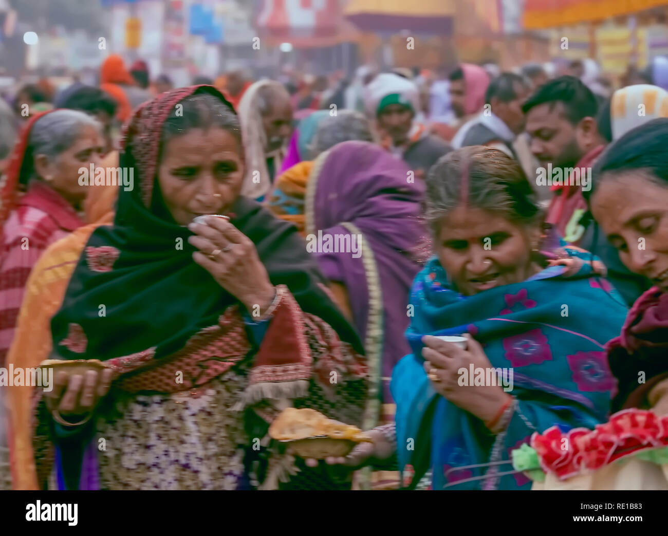 Gangasagar,mela,camp,Kolkata,elderly,female,pilgrims,morning,breakfast,charitable,arrangement,India. Stock Photo