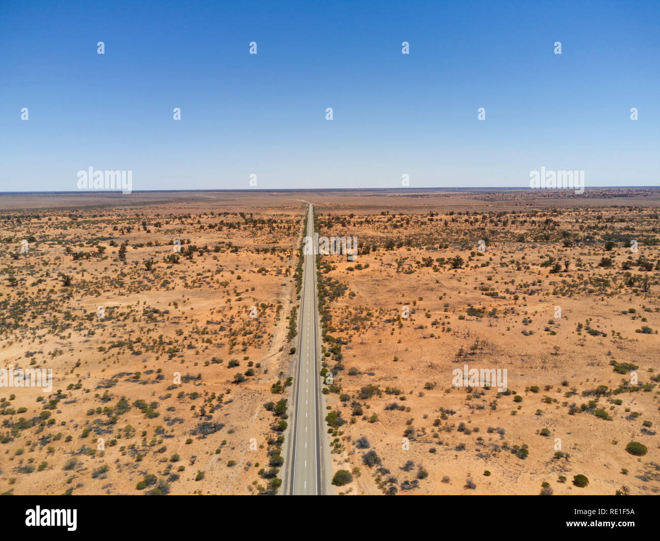 Aerial of the sealed highway passing the the outback to the opal fields of Andamooka South Australia Stock Photo