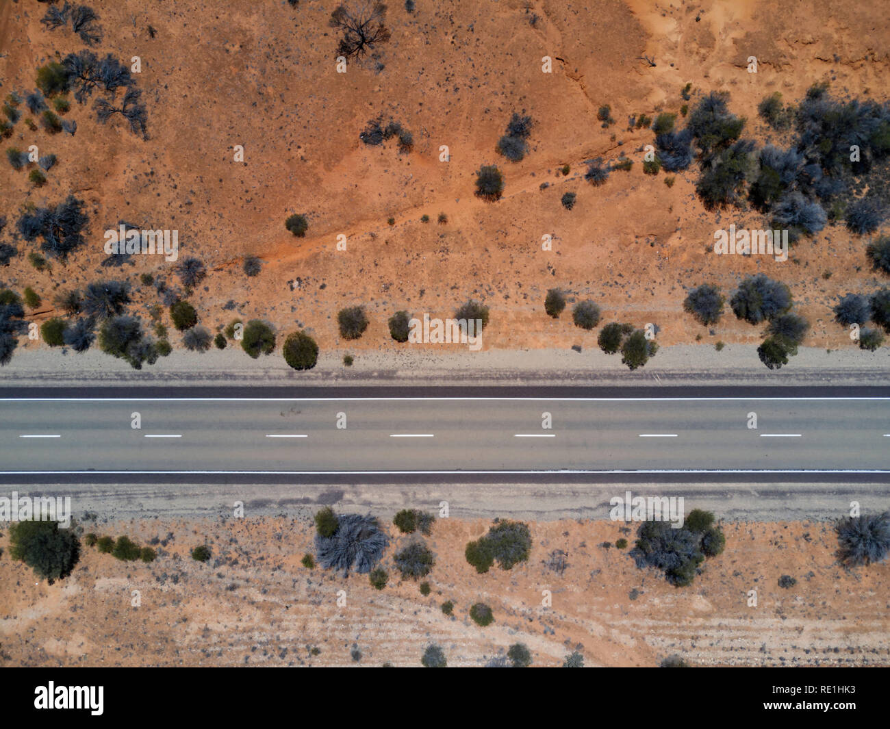 Aerial of the sealed highway passing the the outback to the opal fields of Andamooka South Australia Stock Photo