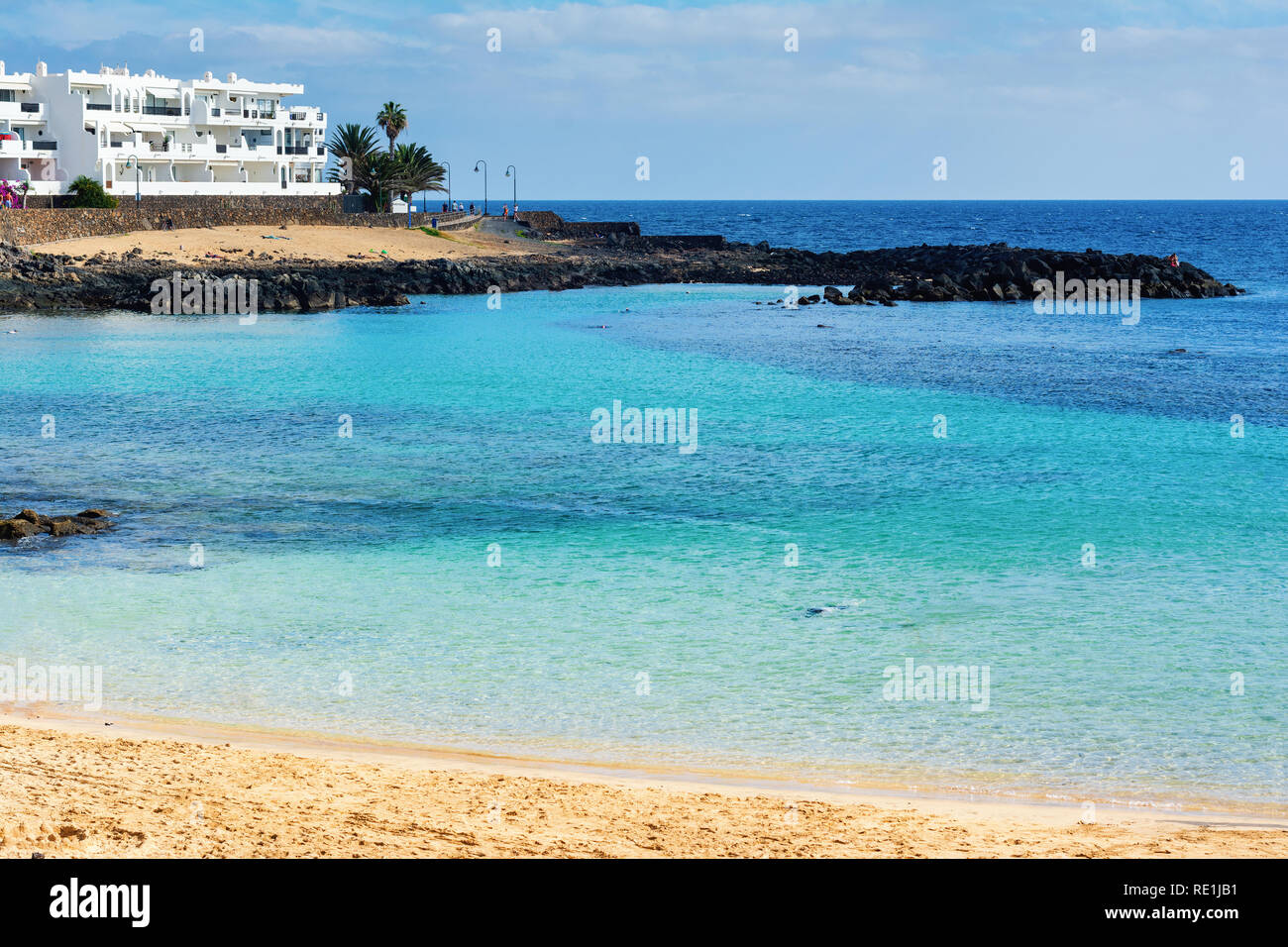 View of Playa Bastian beach in Costa Teguise, Lanzarote, Spain, clear turquoise waters, selective focus Stock Photo