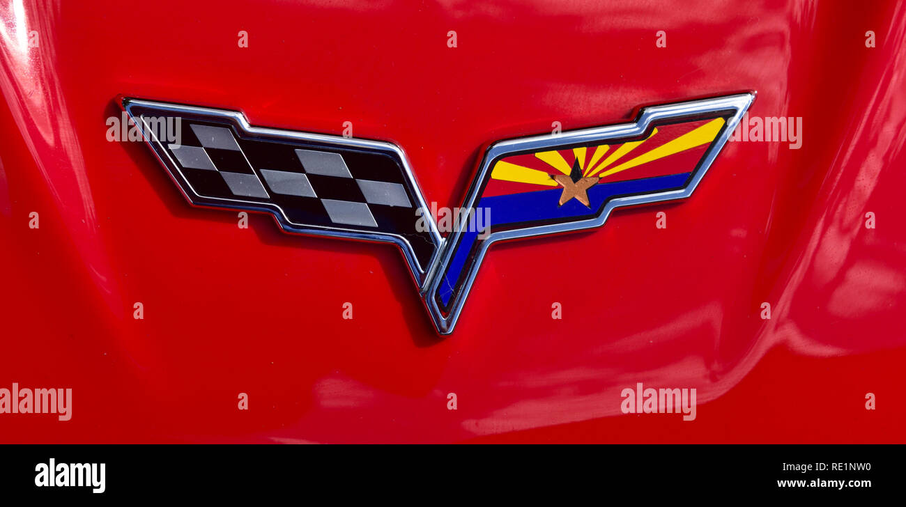 Chevrolet Corvette logo with Arizona flag colors on one side, red Corvette Stock Photo