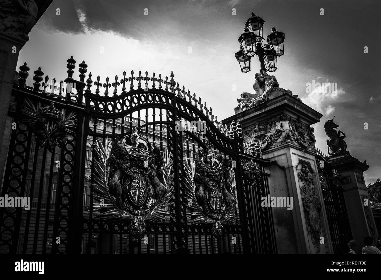 High contrast b&w picture of the ornate main gate with the royal coat of arms at Buckingham Palace in London, United Kingdom Stock Photo