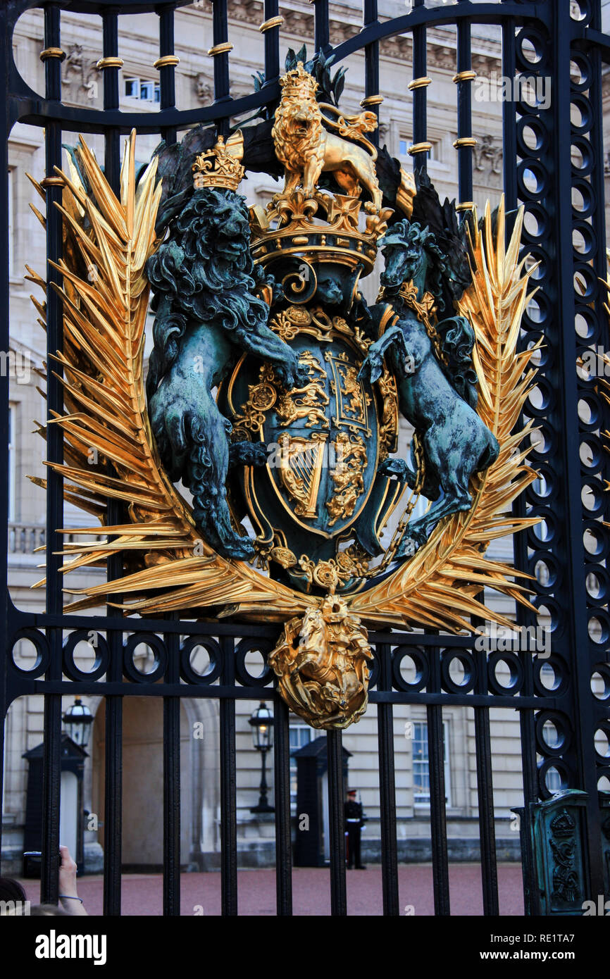 Royal coat of arms at the main gate at Buckingham Palace in London, United Kingdom Stock Photo