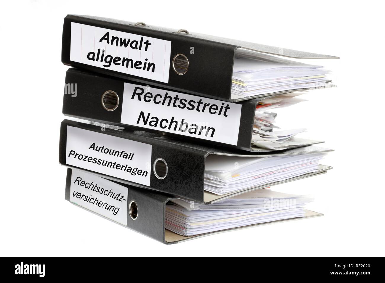 Ring binders, labelled in German for attorney general, neighbor dispute, car accident court documents, legal insurance Stock Photo