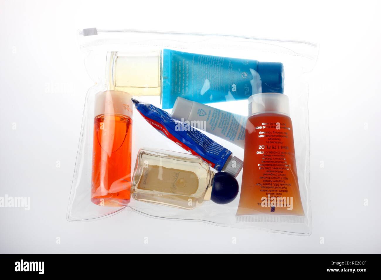 Transparent plastic bag for small quantities of liquids, gels, pastes, creams, which may be carried in hand luggage for air Stock Photo
