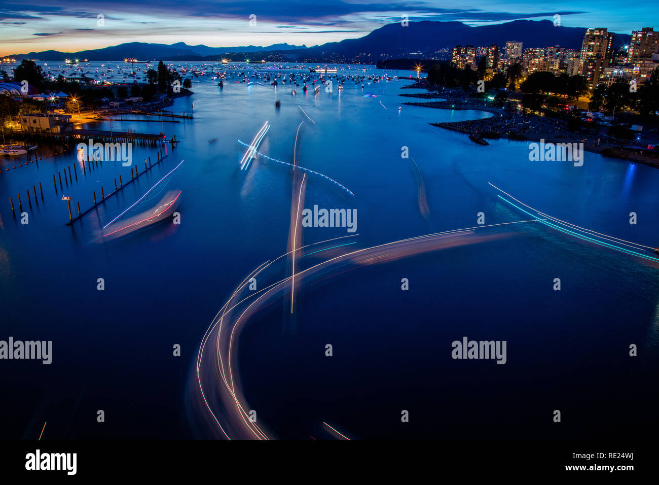 Boat Traffic in False Creek and English Bay in Vancouver BC, during Celebration of Lights Fireworks Festival Stock Photo