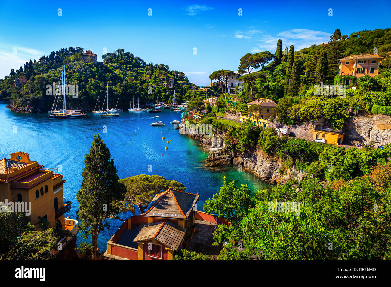 Famous bay with colorful mediterranean buildings and spectacular vacation resort, Portofino, Liguria, Italy, Europe Stock Photo