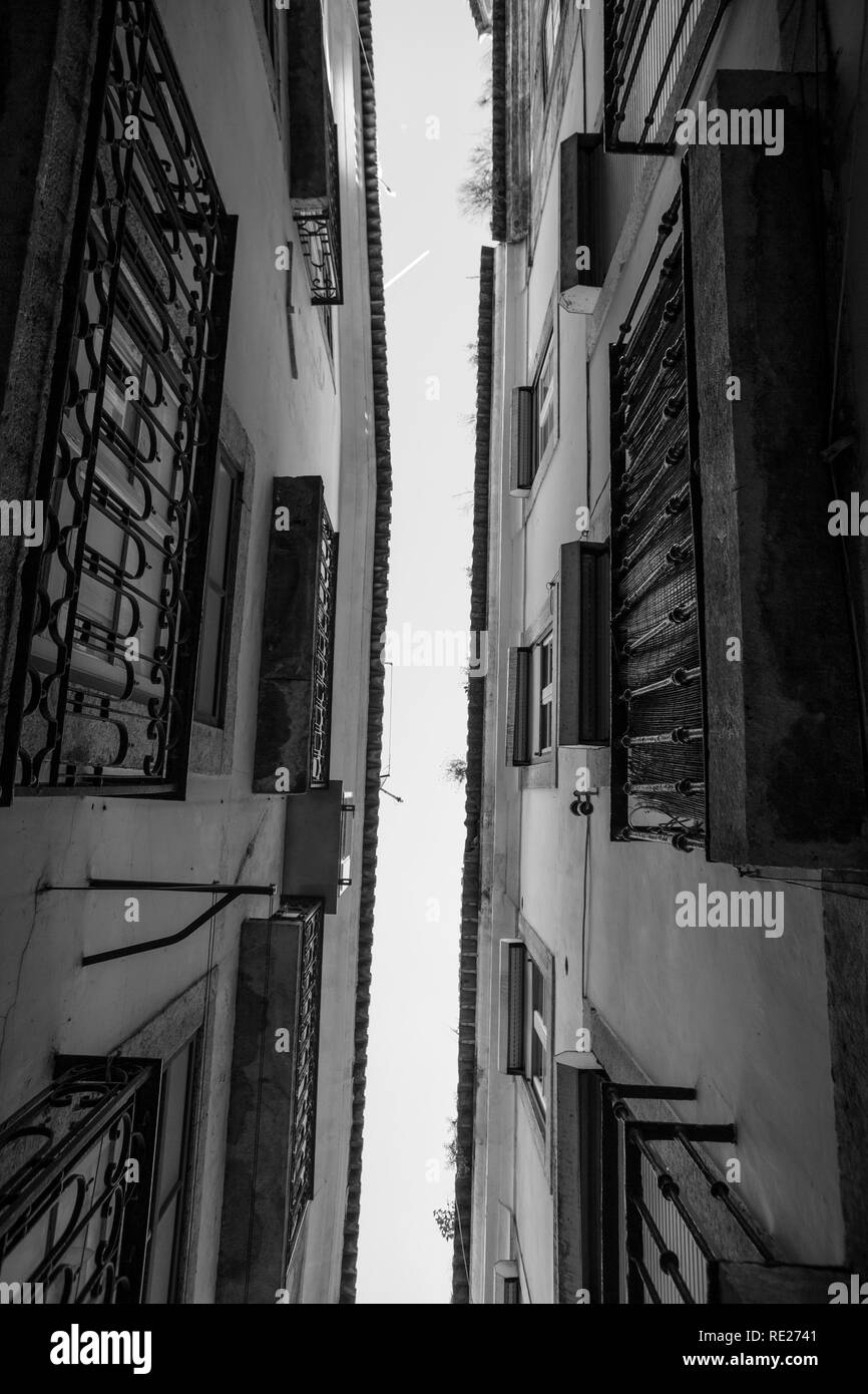 Low angle view of two houses, Lisbon, Portugal. Black and white photo. Stock Photo