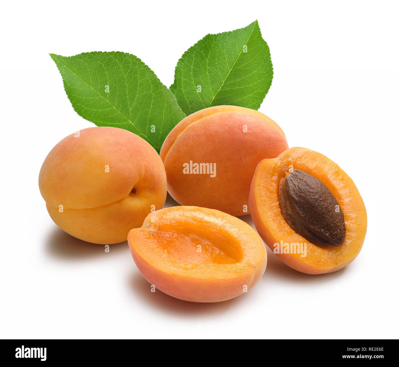 Fresh apricots with leaves isolated on white background Stock Photo - Alamy