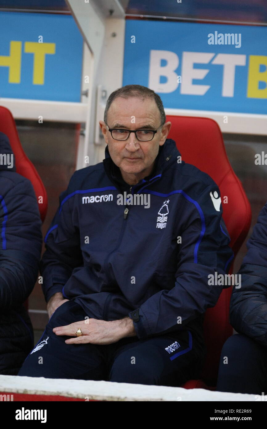Nottingham, Nottinghamshire, UK. 19th January, 2018. Martin O'Neill greets the crowd and takes his place in the Forest dugout as he takes charge of Nottingham Forest for the first time since his appointment as manager. Credit: Simon Newbury/Alamy Live News Stock Photo