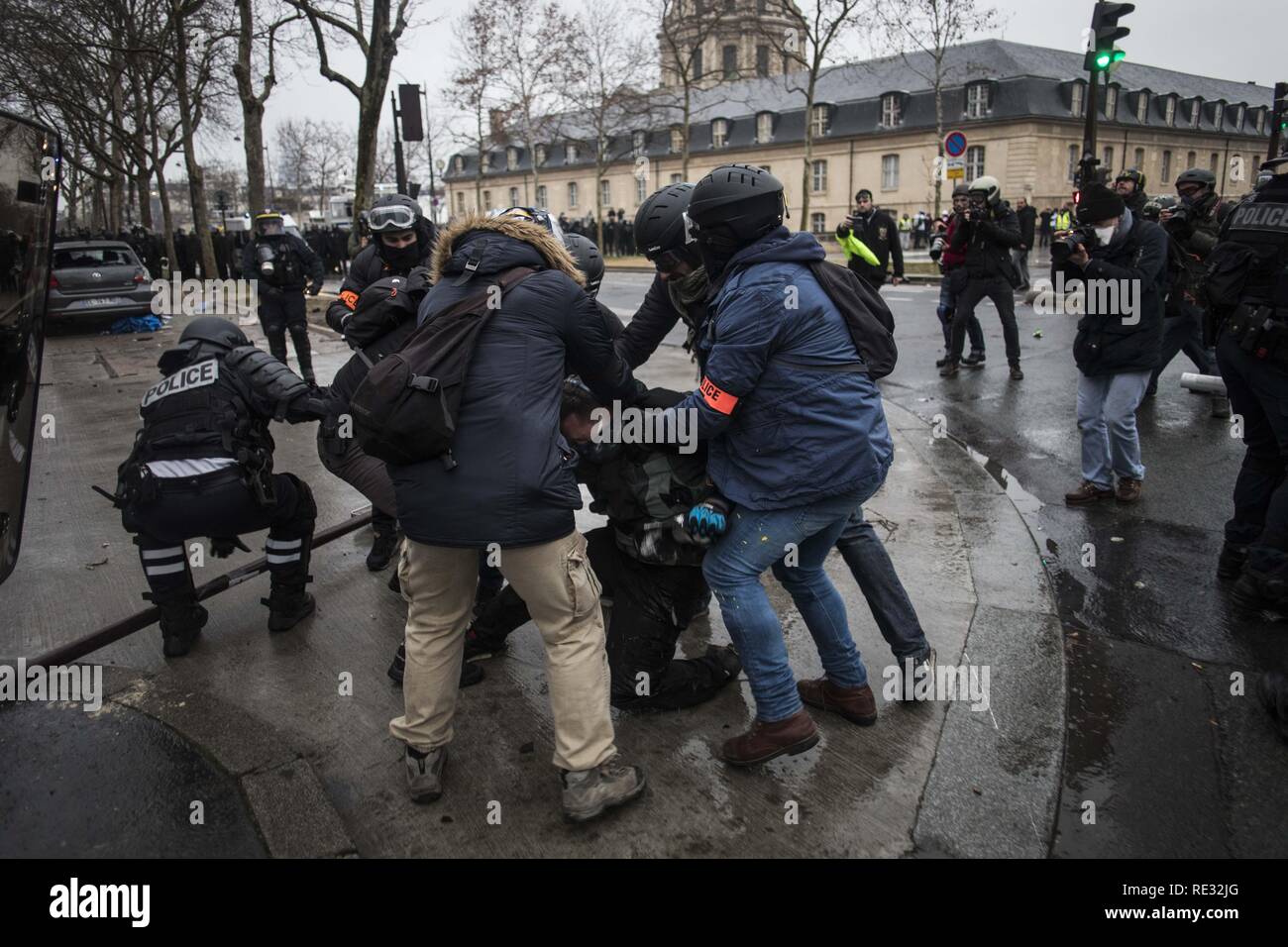 Paris, France. . 19th Jan, 2019. A protestor is arrested by the police during a demonstration against French President Macron policies. Yellow vest protestors gathered and marched on the streets of Paris another Saturday on what they call the Act X against French president Emmanuel Macron's policies. Credit: Bruno Thevenin/SOPA Images/ZUMA Wire/Alamy Live News Stock Photo