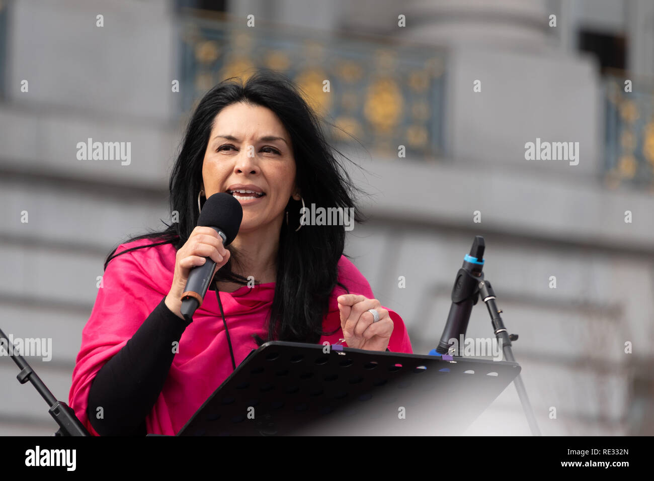 San Francisco, USA. 19th January, 2019. The Women's March San Francisco begins with a rally at Civic Center Plaza in front of City Hall. Plaza. Gilda Gonzales, CEO of Planned Parenthood NorCal (Northern California) addresses the audience. Credit: Shelly Rivoli/Alamy Live News Stock Photo