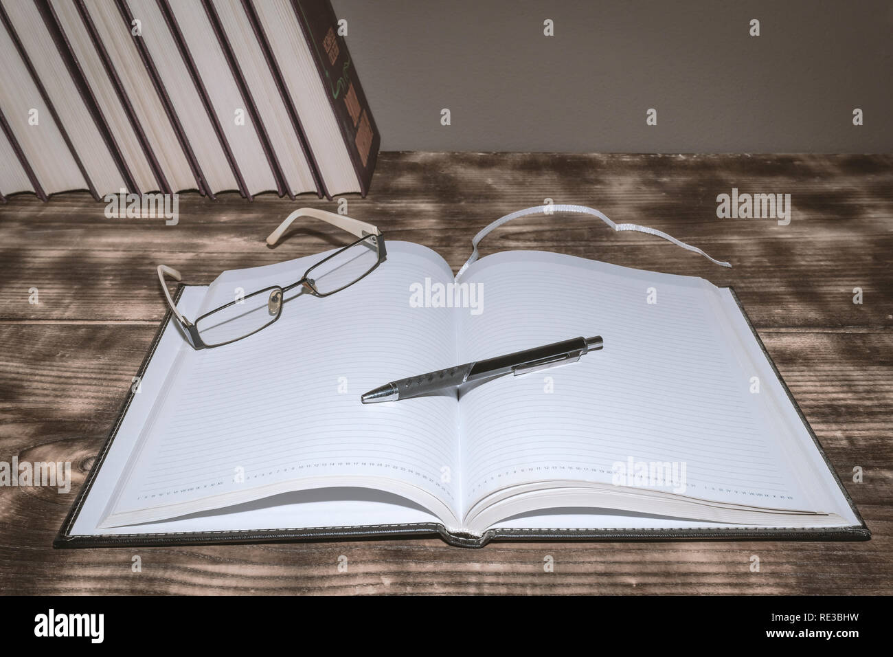 A book on a table without an inscription, ideal for capturing notes Stock Photo