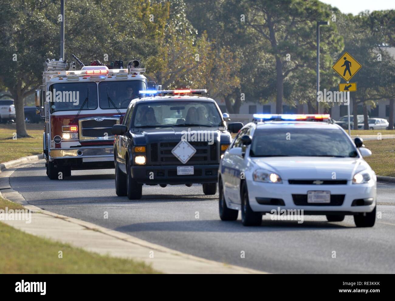 Retired U.S. Air Force Military Working Dog, Mica T204, is escorted to