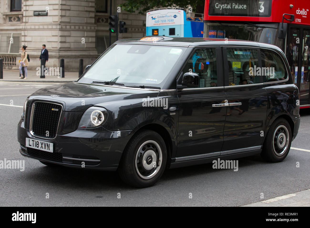 An emissions free LEVC (London EV Company) TX eCity electric Black cab Taxi car. Costing from £55,599 it has a range of 80 miles on electricity alone, Stock Photo