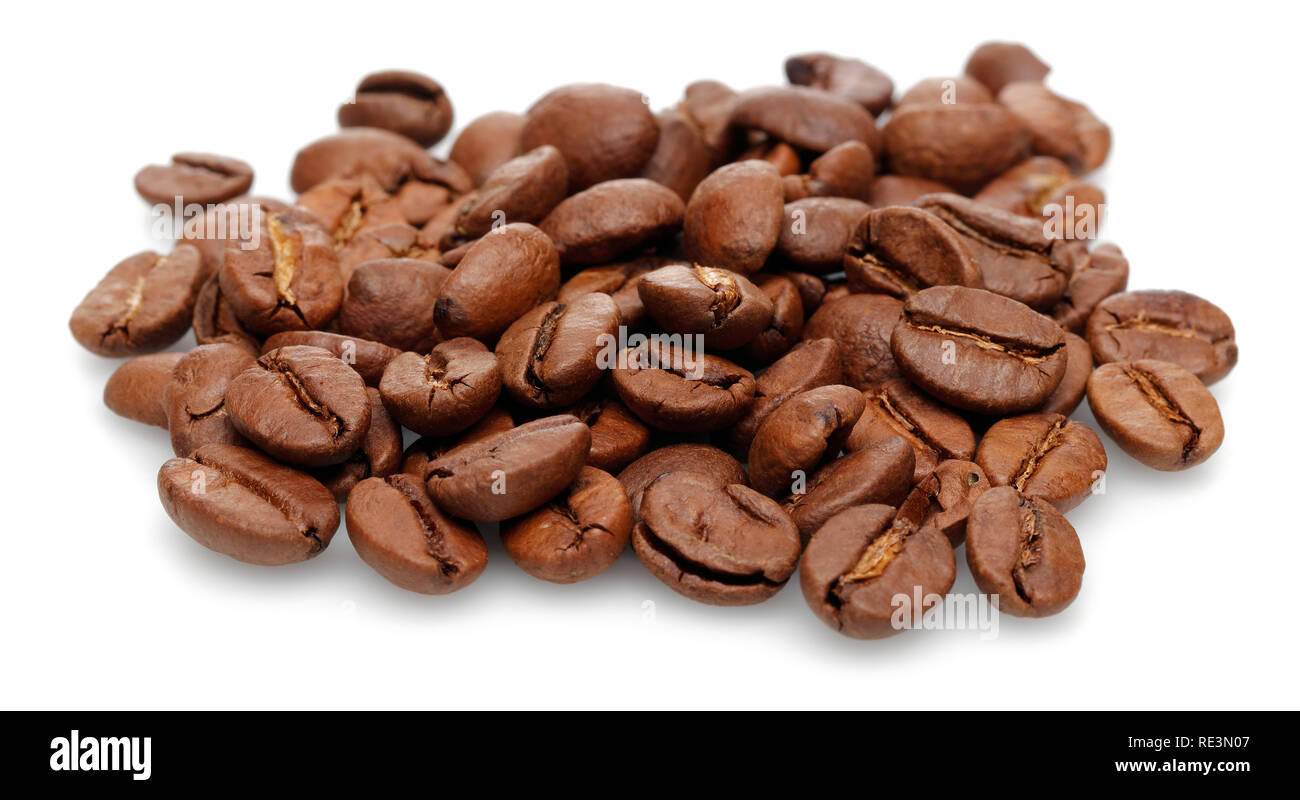 Roasted coffee beans isolated on white background. Macro shot Stock ...