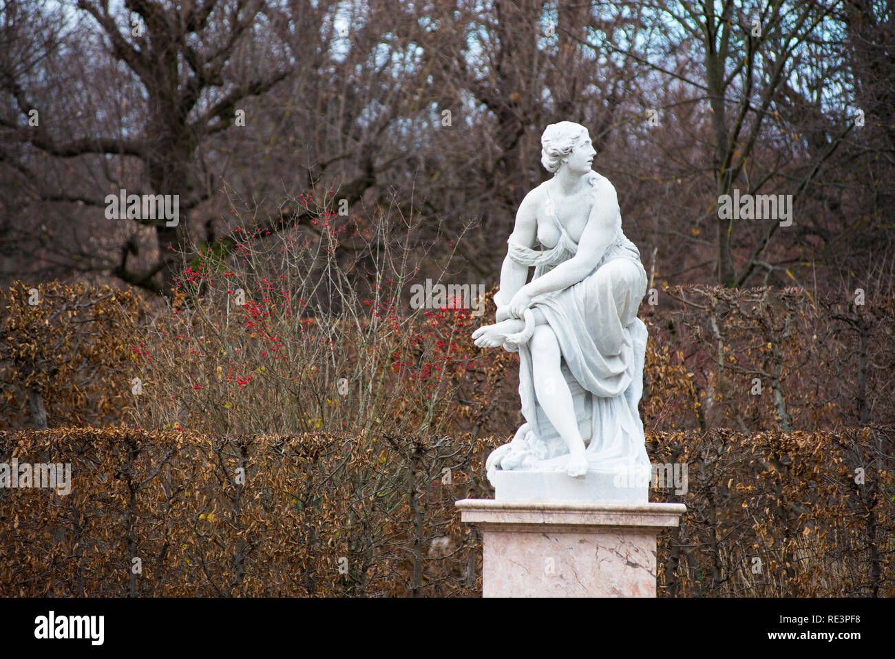 Beautiful marble statues on the grounds of Schloss Schönbrunn palace in winter. Vienna, Austria. Stock Photo