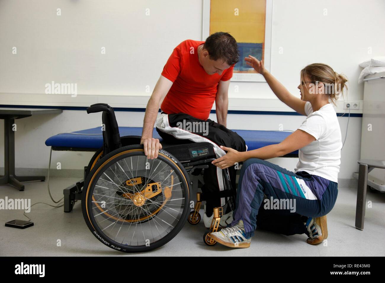 Exercises for mobilisation and movement training, muscle development and coordination exercises for a patient, physical therapy Stock Photo