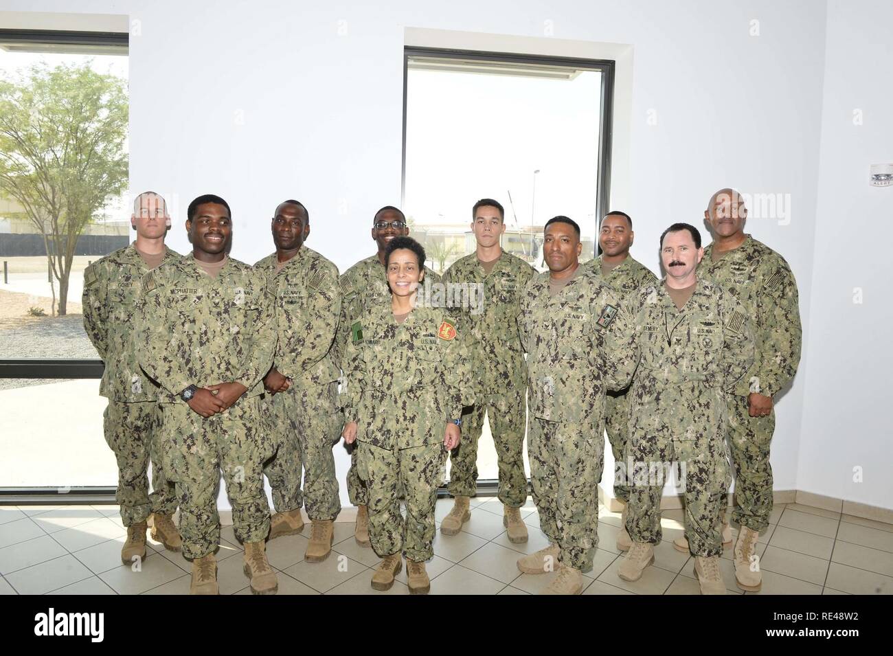 CAMP LEMONNIER (Nov. 21, 2016) Commander, U.S. Naval Forces Europe-Africa /Commander, Allied Joint Force Command Naples, Adm. Michelle Howard, center, and U.S. Naval Forces Europe-Africa Fleet Master Chief Raymond D. Kemp Sr., right rear, meet with Sailor of the Year winners from Coastal Riverine Squadron 11 and Combined Joint Task Force, Horn of Africa Nov. 21, 2016. U.S. Naval Forces Europe-Africa, headquartered in Naples, Italy, oversees joint and naval operations, often in concert with allied, joint, and interagency partners, to enable enduring relationships, and increase vigilance and res Stock Photo