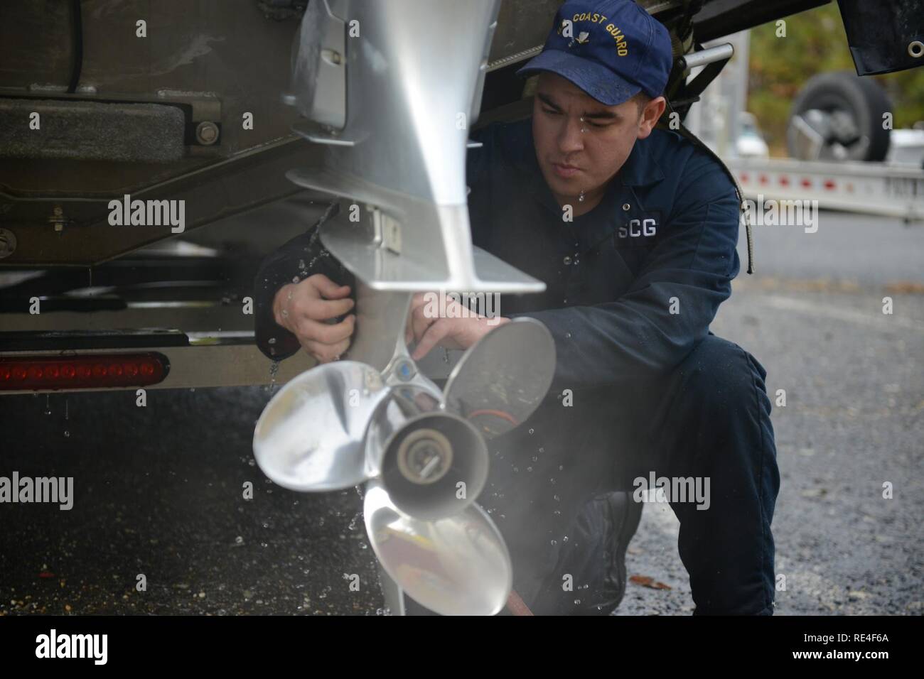 Petty Officer 3rd Class Thomas Aveni, a machinery technician at Coast Guard Station St. Inigoes, troubleshoots a faulty outboard engine while at the unit Wednesday, Nov. 30, 2016. Machinery technicians, or MKs, are trained to work on boat engines, hydraulics and can also serve as electricians. U.S. Coast Guard Stock Photo