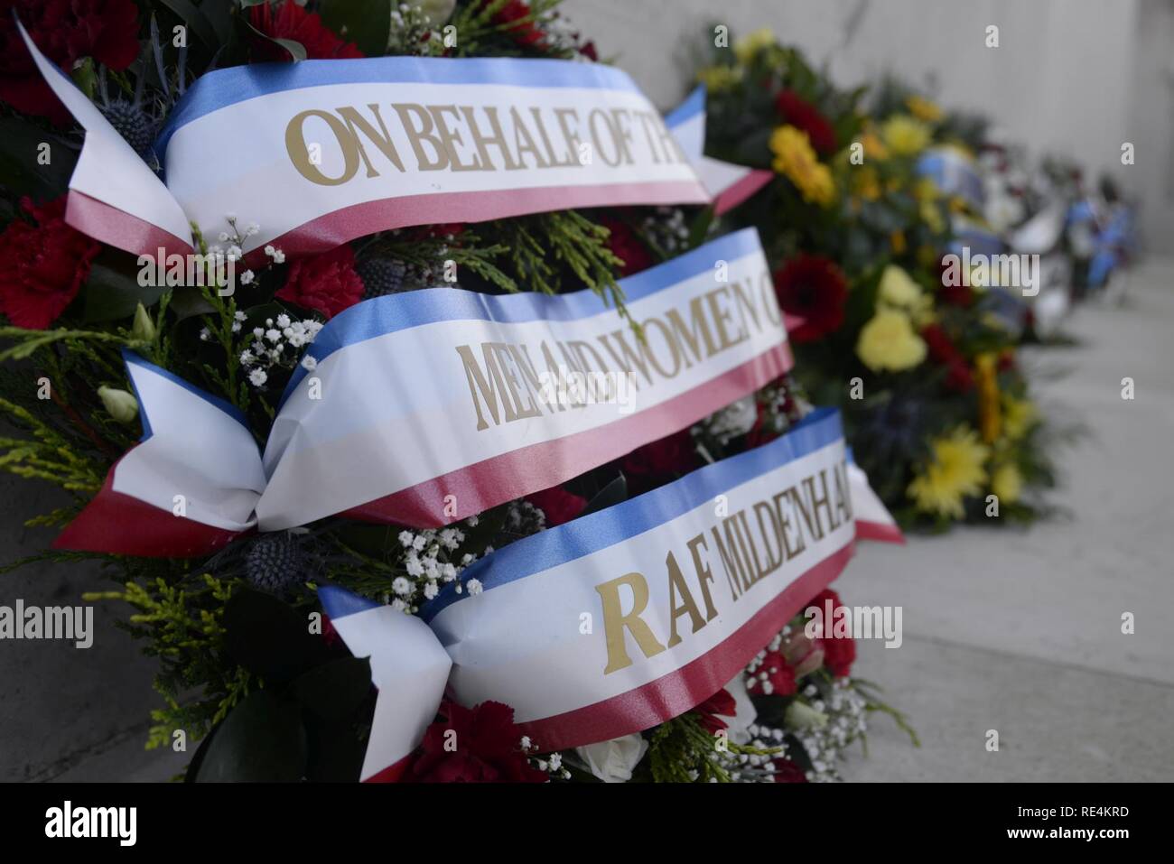 Veterans Day wreaths line the Tablets of the Missing at the Cambridge