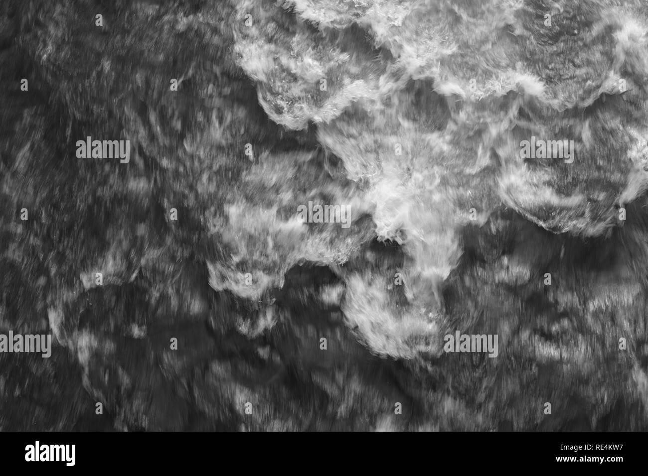 Whitewater Runnings Rapid ofer Rocks Stock Photo Alamy
