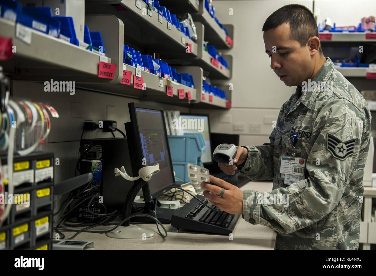 Staff Sgt. Victor Rodriguez, 99th Medical Support Squadron pharmacy technician, scans a