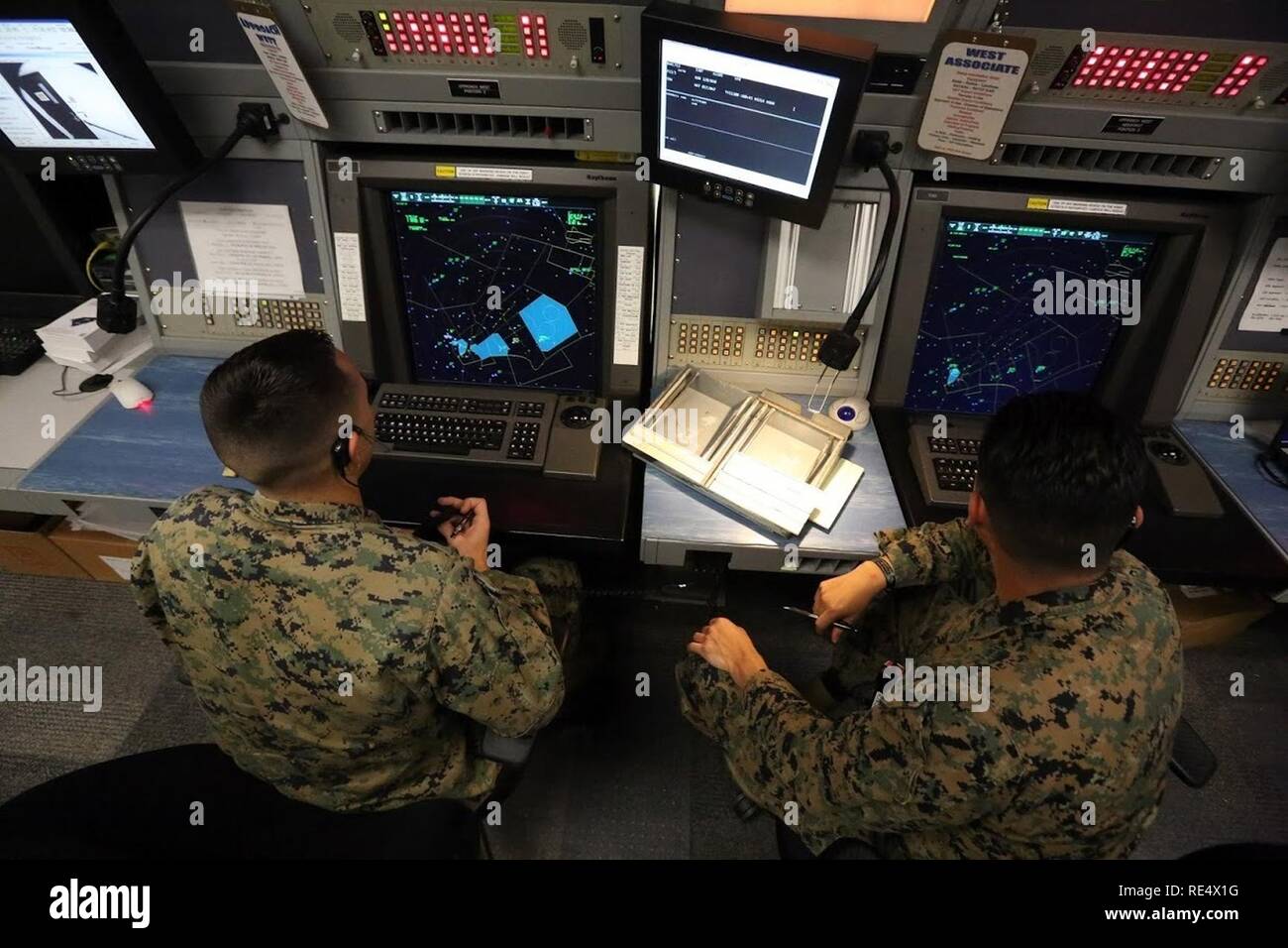 Sgt. Aaron Mondloch, left, receives guidance from Sgt. Benjamin Bonilla ...