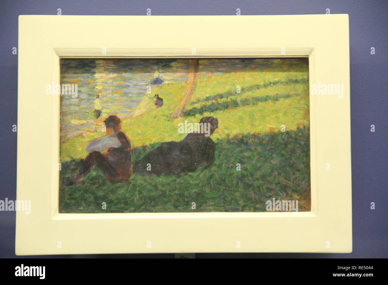 Seated man reclining woman hi-res stock photography and images - Alamy
