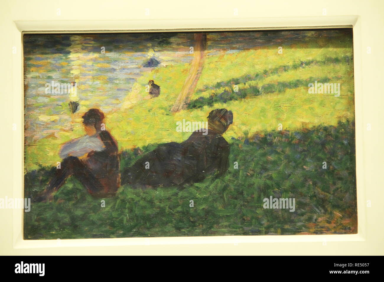 Seated man reclining woman hi-res stock photography and images - Alamy