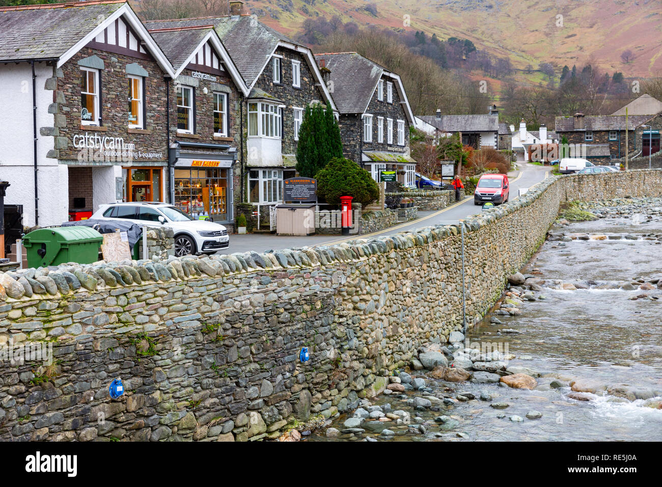 Houses and shops in Glenridding village centre, Ullswater,Lake District. Glenridding was damaged by storm desmond in 2015,Cumbria,England Stock Photo