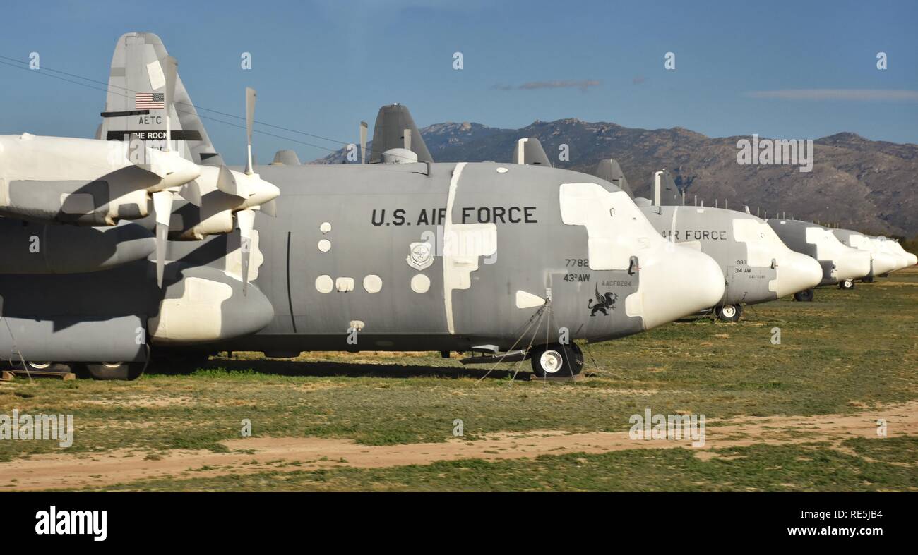 A fleet of C-130 cargo planes in long-term storage at the Air Force Boneyard at Davis-Monthan, operated by the AMARG Stock Photo
