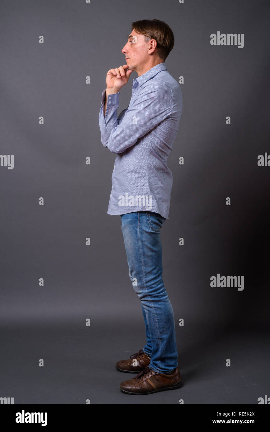 Side profile man full length hi-res stock photography and images - Alamy