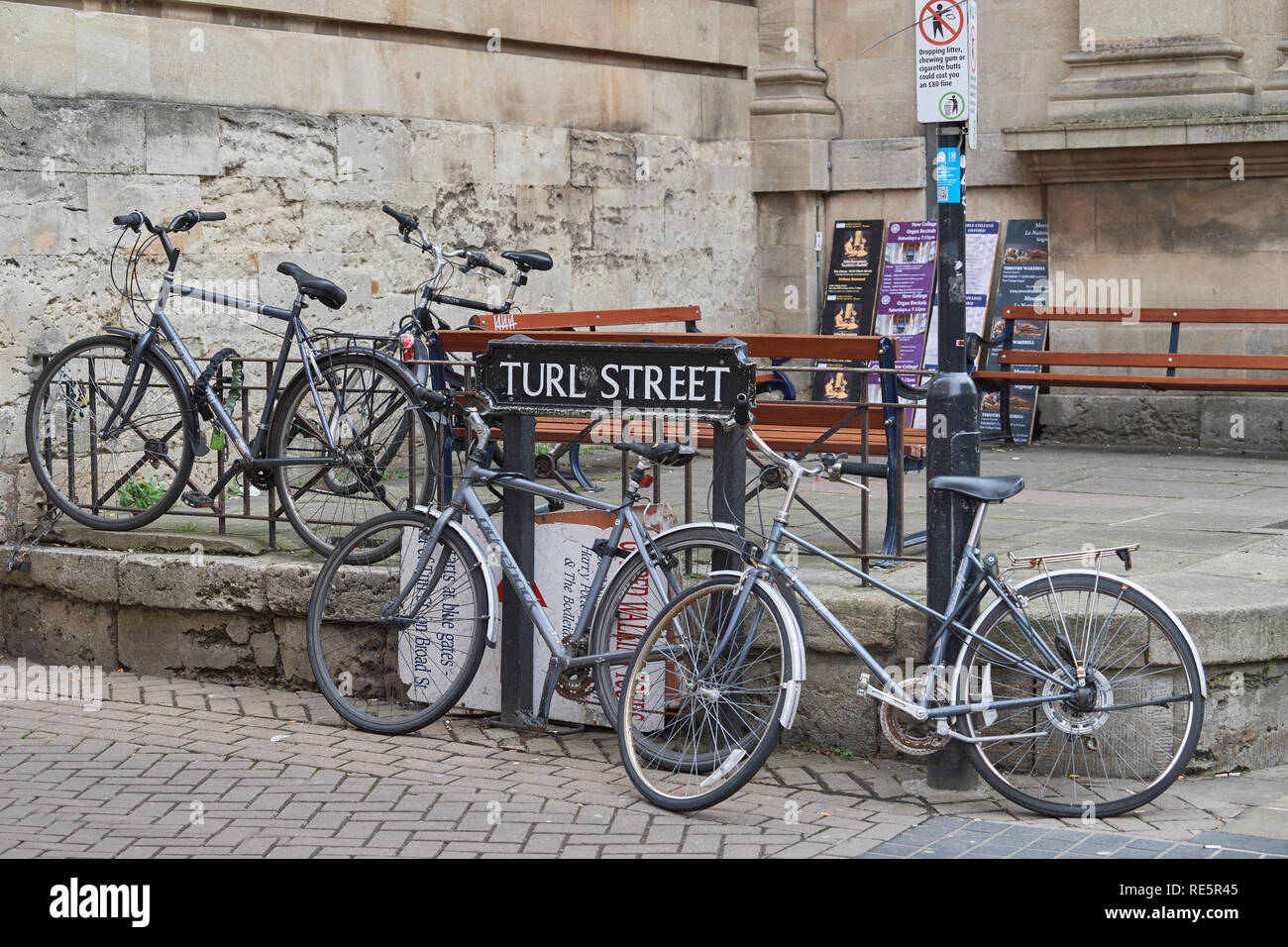Bicycles parked outside Lincoln college, university of Oxford, at the south end of Turl street. Stock Photo