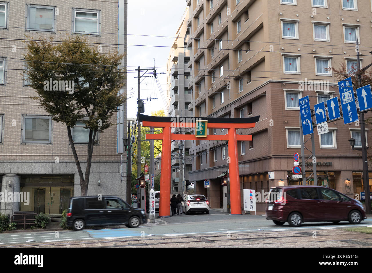 Kumamoto, Japan - November 14, 2018:Torii to the hidden Kamitoricho Temple in the centre of Kumamoto city Stock Photo
