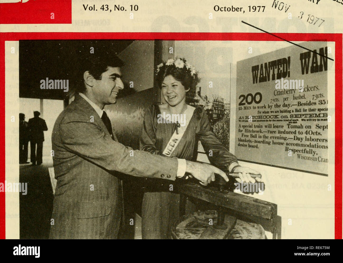 . Cranberries; : the national cranberry magazine. Cranberries. CRANBERRIES THE IMATIOIMAL CRANBERRY MAGAZINE Vol. 43, No. 10 October. 1977 ^&gt;Vv. S/r '^^^4?^ce^. Massachusetts Governor Michael Dukakis joins 1977 &quot;Cranberry Festival Queen&quot; Bonnie Willard in turning old-fashioned barrel-header for sealing tops of cranberry barrels-one of the many colorful artifacts on exhibit at the new &quot;Cranberry World&quot; Museum in Plymouth, Mass. CT. //I This Issue ... ^ ^ (-5 OREGON GROWER FINDS WATER .^i .l&quot; WASHINGTON SCIENTISTS ANSWER QUESTIONS .^r^ .5^ MARKETING ORDER HEARING ?^  Stock Photo